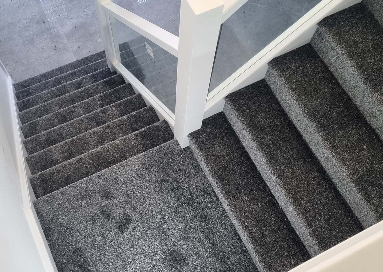 Domestic carpet on l shape stairs